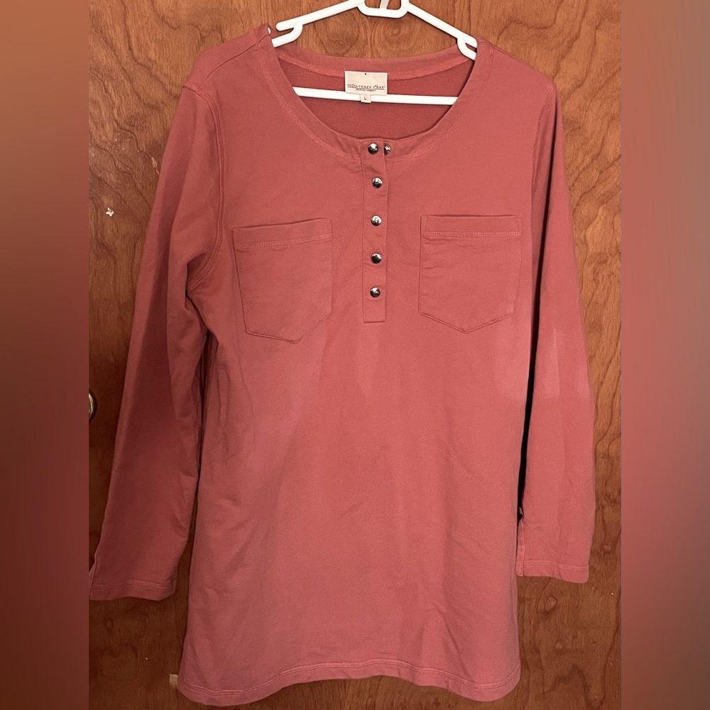 Woman Monterey bay pullover top with 5 snaps has slits on arms and waist Warm